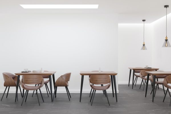 Empty white wall in modern cafe. Mock up restaurant interior in contemporary style. Free, copy space